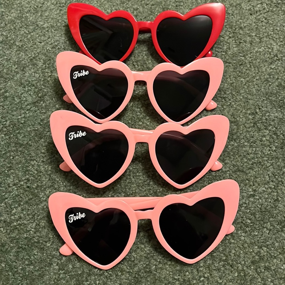 Sunglasses. 3 pink with tribe sticker. 1 red